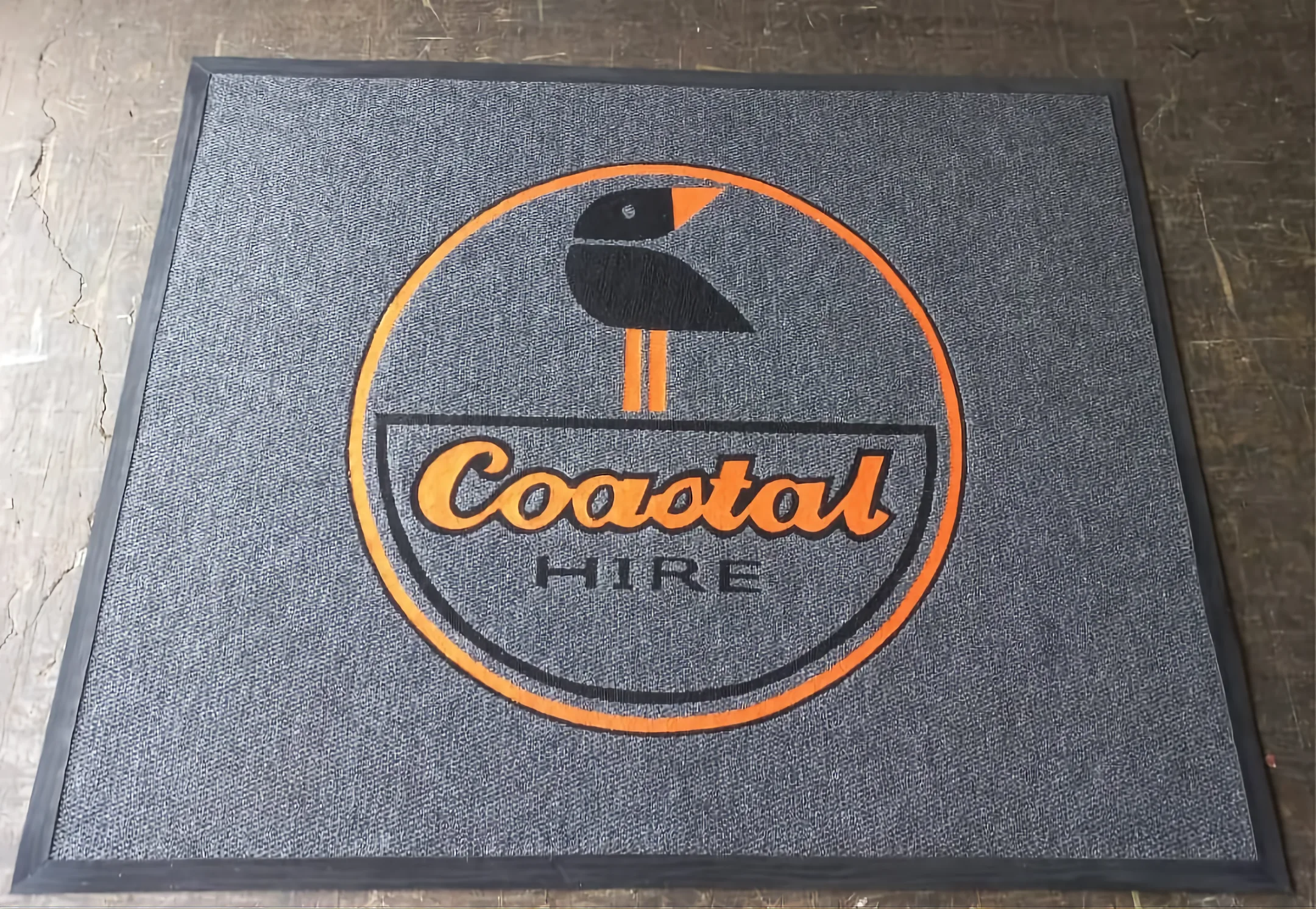 Logo entrance mat manufactured for a corporate office lobby