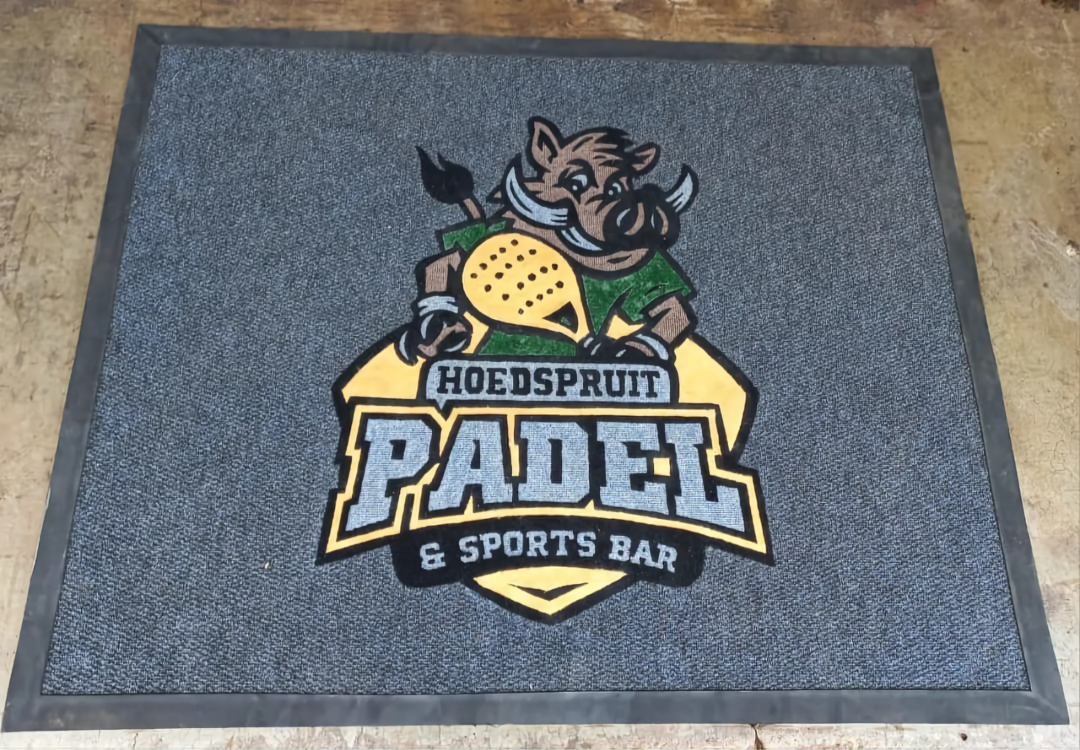 Commercial entrance mat manufactured for a university campus