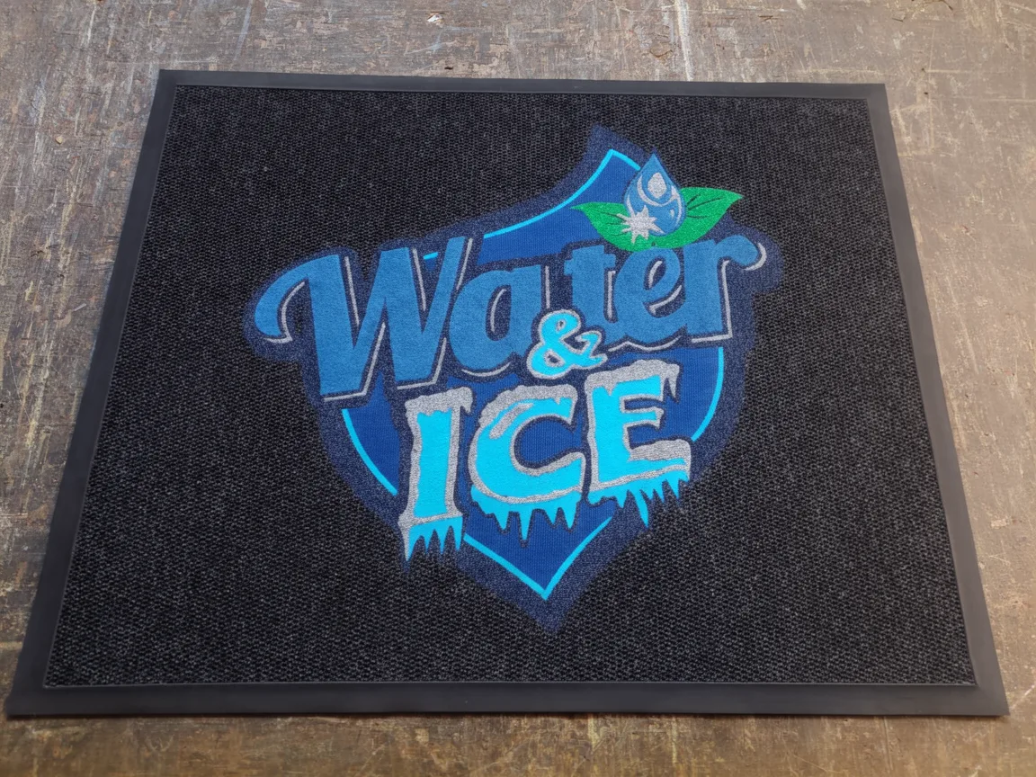 Branded entrance mat for a retail store entrance